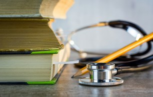 text books and stethoscope