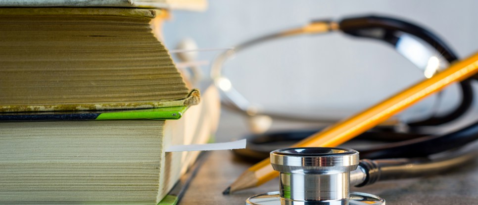 text books and stethoscope